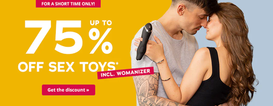 Advertisement with a two-tone background in yellow and blue. There is a couple holding each other in the foreground, the woman is holding a sex toy. The text reads 'Up to 75% off sex toys incl. Womanizer'. There is a short element at the top with the text 'For a short time only!' There is a call-to-action button at the bottom with the words 'Get the discount'.