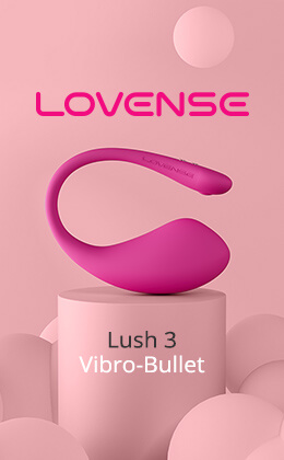 Advertisement with a pink background. The Lovense logo in pink is on the left. Below it is the text 'Closing the Distance' in gray letters. The 'Lush 3 Vibro-bullet' product in pink is on the right. The product is lying on a pink pedestal. There is call-to-action button with a red background at the bottom with the white text 'Improve your sex life »'